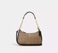 Coach Gold Leather Handbag